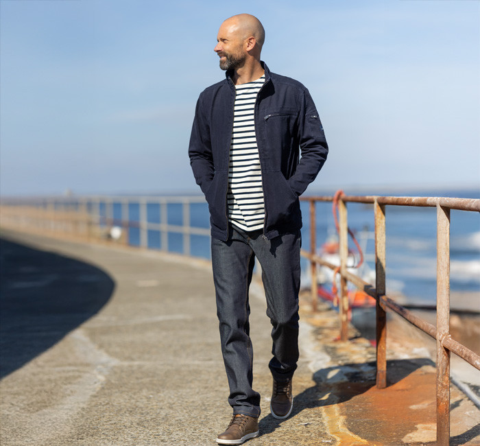 Man wearing raw denim jeans made in France Mousqueton