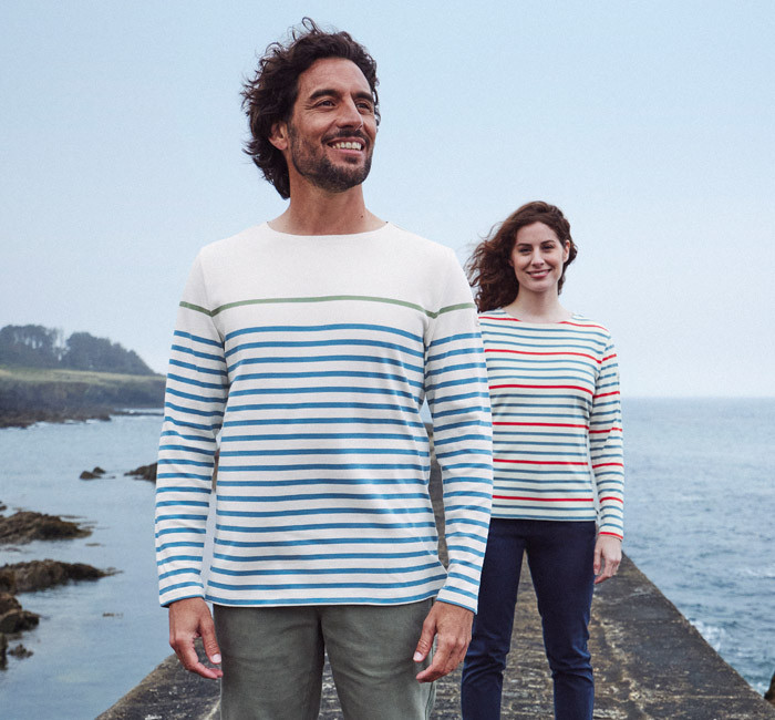 Man with blue striped T-shirt and woman with multicolored striped T-shirt