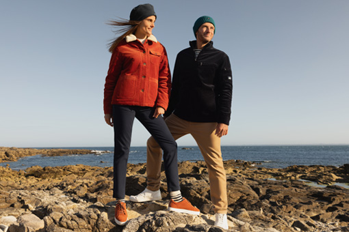 Un homme et une femme habillés en collection automne hiver Mousqueton